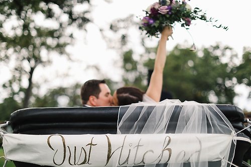 Bride and Groom in the carriage